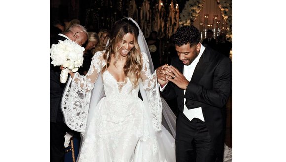 Singer Ciara has one-two stepped down the aisle with NFL player Russell Wilson. The couple both posted the same photo ...