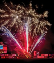 Celebration at The Diamond //
Overcast evening skies didn’t dampen the color and spectacle of Fourth of July fireworks at The Diamond on Monday, where a sellout crowd of more than 9,500 people enjoyed the sky show following the Richmond Flying Squirrels’ game. All around, it was a night of fun, with the Squirrels beating the Reading Fightin’ Phils 18-1. The Squirrels blasted three home runs, followed by the fireworks display that was a home run with the crowd. 