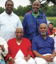 Senior Judge Damon J. Keith, seated left, of the 6th U.S. Circuit Court of Appeals in Detroit hosts his annual Independence Day picnic in Hanover County, where he honored Judge Roger Gregory, seated second from right, named the new chief judge of the 4th U.S. Circuit Court of Appeals in Richmond. With them, standing from left, are U.S. District Judge Raymond A. Jackson of Norfolk and Senior U.S. District Judge Sterling Johnson Jr. of New York, and, seated from left, Elaine Jones, former president and director-counsel of the NAACP Legal Defense Fund, and former Gov. L. Douglas Wilder.  