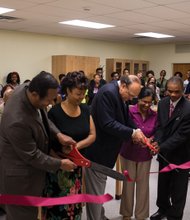 Virginia Union University President Dr. Claude G. Perkins, center, takes part in the recent ribbon-cutting ceremony at the new physics lab in Ellison Hall. He is joined by, from left, Dr. Gerard McShepard, chair of the Department of Natural Sciences; Dr. LaTrelle Green, dean of the School of Mathematics, Science and Technology; and Dr. Shaheen Islam and Dr. Francis Mensah, both of the Department of Natural Sciences. 