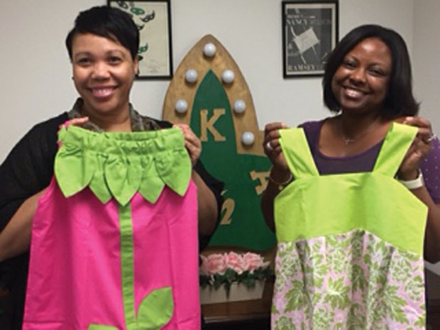 AKAs make dresses for girls in Africa //
Johnelle M. Torbert, left, president of the Upsilon Omega
Chapter of Alpha Kappa Alpha Sorority, and Kwanza S.
Downs display two of the 225 dresses chapter members
crafted with family and friends for the sorority’s “Little
Dresses for Africa” project. AKA chapters across the
country made dresses to send to girls in Tanzania, South
Africa and Liberia as part of its “Twenty-three Moments
of Service” honoring the memory of Mary Shy Scott, the
sorority’s 23rd international president. The dresses are
being collected at the sorority’s 67th Boulé this week in
Atlanta. Ms. Downs served as chairman of the Richmond
chapter’s dressmaking project.