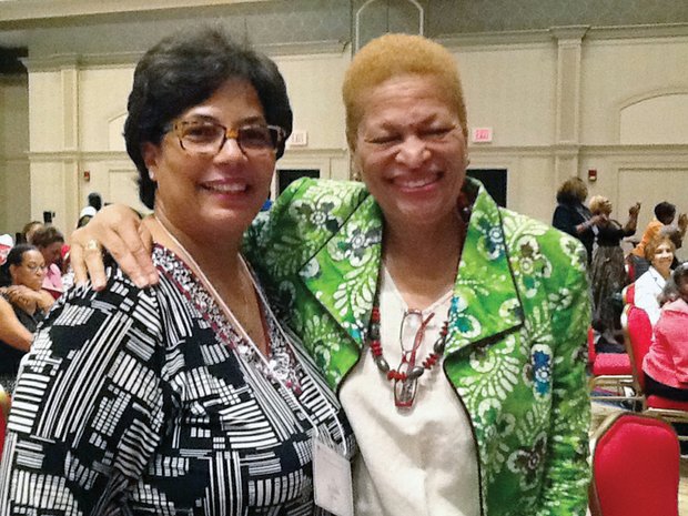 Promoting leadership //
Former Bennett College President Julianne Malveaux, right, is greeted by Dr. Delta R. Bowers, president of the Richmond Metropolitan Area Chapter of the National Coalition of 100 Black Women. Dr. Malveaux, an economist and author, was the keynote speaker for the organization’s national leadership retreat held June 22 through 25 at a Richmond area hotel. More than 200 women from across the country attended the retreat, which focused on the organization’s advocacy efforts in health, education and economic empowerment.