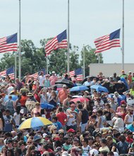 A multiethnic crowd gathers Saturday near the Washington Monument for “Together 2016,” an evangelical Christian prayer rally. The flags were at half-mast for the victims of the terrorist attack in Nice, France, on July 14.