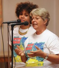 Linking with Cuba //
Gladys Abella, right, with the Martin Luther King Center in Havana, Cuba,
is assisted by translator Claudia De La Cruz of the IFCO/Pastors for Peace as she discusses life in Cuba under the U.S. trade and travel embargo. She spoke during a July 7 meeting at Wesley Memorial United Methodist Church in the East End that focused on links between Cuba and Africans. Her visit was organized by the African Awareness Association.