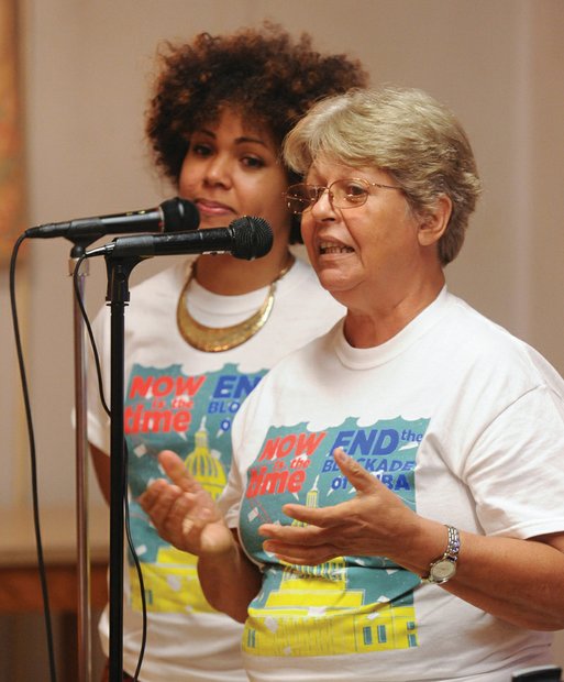 Linking with Cuba //
Gladys Abella, right, with the Martin Luther King Center in Havana, Cuba,
is assisted by translator Claudia De La Cruz of the IFCO/Pastors for Peace as she discusses life in Cuba under the U.S. trade and travel embargo. She spoke during a July 7 meeting at Wesley Memorial United Methodist Church in the East End that focused on links between Cuba and Africans. Her visit was organized by the African Awareness Association.