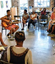 Emporess Benniefield and Oryan Law perform “Tears of a Nation” during the open mic session at ART 180’s Black Lives Matter Youth Forum last Friday. 