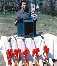 City Councilman Tim Kaine, with 11-month-old daughter Annella, at 1995 groundbreaking