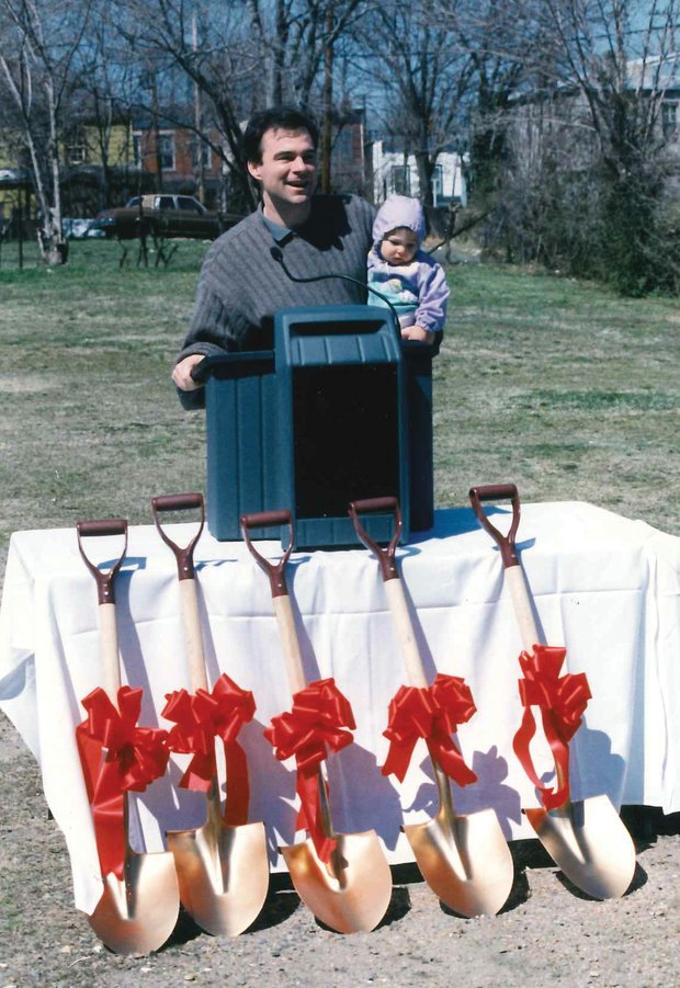 City Councilman Tim Kaine, with 11-month-old daughter Annella, at 1995 groundbreaking