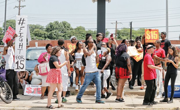 Protesters also called for pay hikes for workers to $15 an hour. The franchise brought in workers from other chain locations to keep the fast food restaurant open during the picketing. McDonald’s representatives did not respond to Free Press requests for comment. //