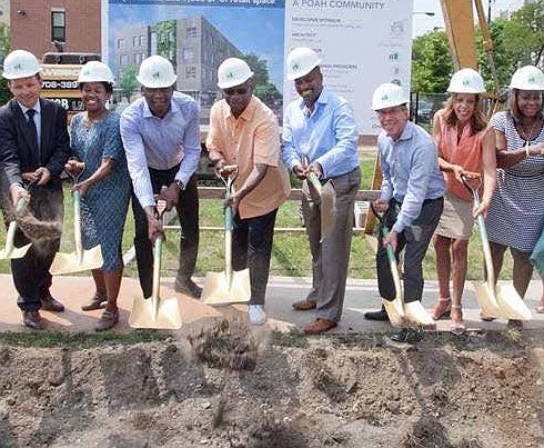 Financial, investment and community partners join (center) 20th Ward Alderman Willie B. Cochran, (l-r) Antonio Riley, Midwest Director U.S. Department of HUD, Aaron Gornstein, President and CEO, POAH, Andrea Zopp, Deputy Mayor, Chief Neighborhood Development Officer and Yolanda Wofford, Owner of Lala’s Land of Learning Child Care Center to break ground on Trianon Lofts, the first predominantly market rate rental housing to be constructed in Woodlawn in over 50 years. Photo Courtesy of POAH