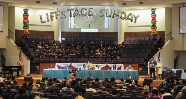 Panelists address audience questions at Sunday’s “Stop the Violence” rally. About 200 people participated in the event sponsored by the National Funeral Directors & Morticians Association at Saint Paul’s Baptist Church in Henrico.