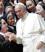 Pope Francis is greeted by nuns in St. Peter’s Square at the Vatican during a recent jubilee audience. Women have long sought a greater role in the Roman Catholic Church.