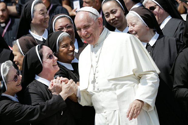 Pope Francis is greeted by nuns in St. Peter’s Square at the Vatican during a recent jubilee audience. Women have long sought a greater role in the Roman Catholic Church.