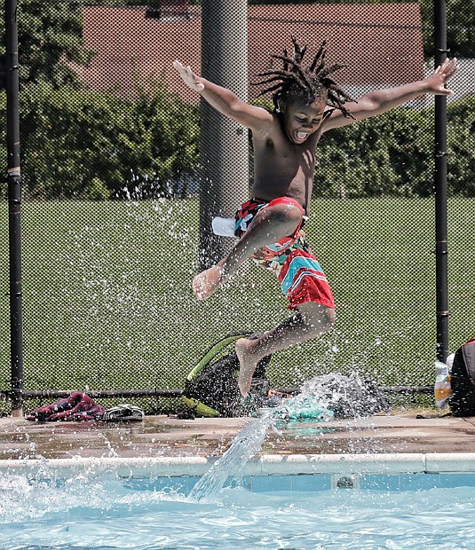 Beating the heat
Sweltering temperatures that reached nearly 100 degrees this week were enough to convince Donovan Walker to cool off by jumping into the Hotchkiss Pool at 701 E. Brookland Park Blvd. in North Side. Periods of heavy rain brought some brief relief, but it didn’t last long. Weather forecasters predict slightly lower temperatures over the next few days. Highs are expected in the mid- to upper 80s with scattered thunderstorms.