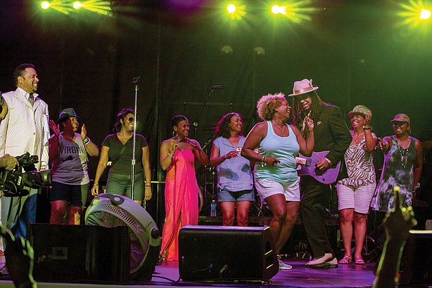 Ladies picked from the audience show off a few moves with Morris Day and The Time.