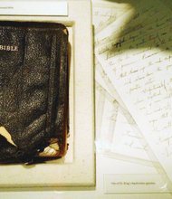 Above is a view of his well-worn Bible, which was used by President Obama to take the oath of office in January 2013. Questions remain about what will happen to these family heirlooms. 