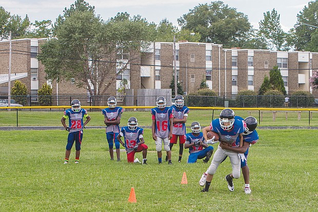 George Wythe High School’s team practices Tuesday in preparation for this season’s matchups against opponents from larger schools in the Richmond area. 