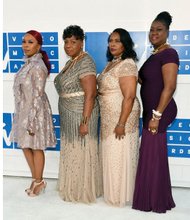 From left, Lesley McSpadden, mother of Michael Brown; Gwen Carr, mother of Eric Garner; Wanda Johnson, mother of Oscar Grant; and Sybrina Fulton, mother of Trayvon Martin, pose Aug. 28 at the MTV Video Music Awards, where they were guests of Beyoncé at the glitzy ceremony. 