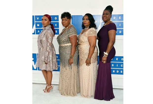 From left, Lesley McSpadden, mother of Michael Brown; Gwen Carr, mother of Eric Garner; Wanda Johnson, mother of Oscar Grant; and Sybrina Fulton, mother of Trayvon Martin, pose Aug. 28 at the MTV Video Music Awards, where they were guests of Beyoncé at the glitzy ceremony. 