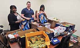 Marquette Bank employees packed school supplies Bank location. donated for its annual Neighborhood School Supplies Drive, which benefited sixteen local organizations.