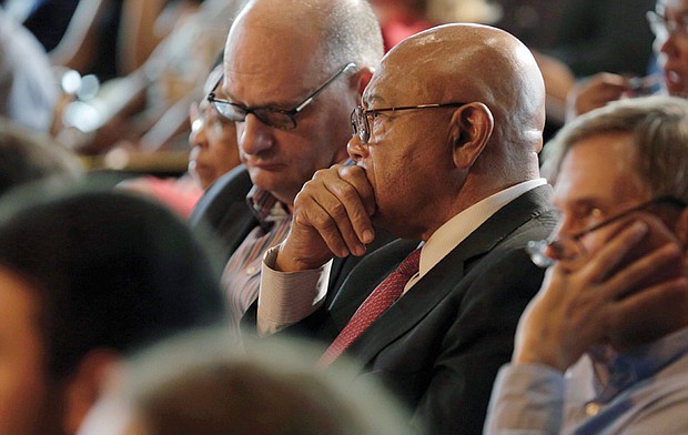 Joe Stewart, center, listens intently as Georgetown University lays out its plans to deal with its links to slavery. His forebears were among the enslaved people the Jesuit-run university sold in 1838 to pay off debts. 