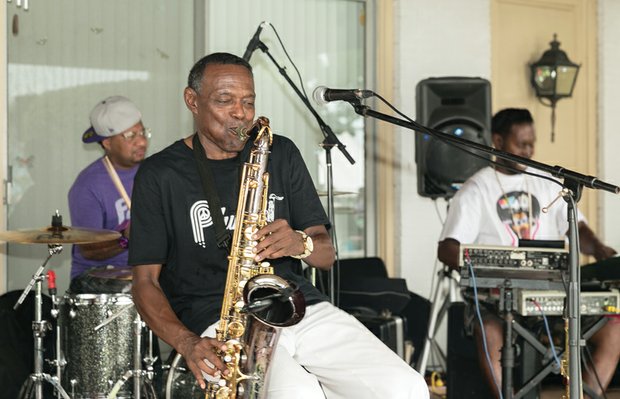 Saxophonist James “Plunky” Branch of Richmond
and his group, Plunky & Oneness, provide the musical
entertainment for the event.