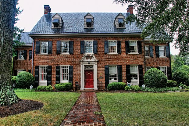 The work of more than 30 designers will be showcased throughout the 1929 Georgian revival home on Hawthorne Avenue. Below, Mrs. Baskerville holds the deed to her family’s Buckingham County property. The deed is one of many family heirlooms featured in the Designer House.