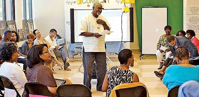 A member of the Emotional Emancipation Circle speaks before the group circle. The Emotional Emancipation Circle is a healing component of the Community Healing Network. The need for such group circles will be presented during the 2016 Valuing Black Lives Global Summit