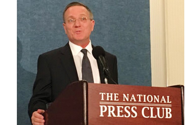 Brian Grim, associate scholar at Georgetown University’s Religious Liberty Project, presents his study Sept. 14 at the National Press Club in Washington.