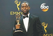 Sterling K. Brown shows off the outstanding supporting actor in a limited series Emmy he won for a movie portraying prosecutor Christopher Darden in “The People v. O.J. Simpson.”
