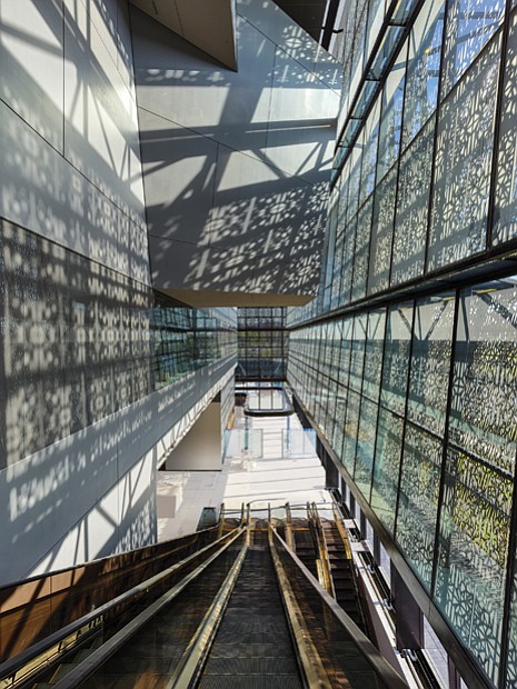 Light pours through the exterior metal panels, illuminating
the interior of the new National Museum of African
American History and Culture in Washington. It is the first
LEED Gold certified museum on the National Mall.