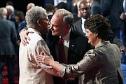
Vice presidential nominee Tim Kaine, center, and his wife, former Virginia Secretary of Education Anne Holton, are congratulated by former state Sen. Henry L. Marsh III of Richmond after Tuesday’s debate in Farmville. Mr. Marsh was among Sen. Kaine’s special guests at the nationally televised event at Longwood University.