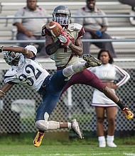 
Virginia Union University wide receiver Lavatiae Kelly snags the ball for a third-quarter touchdown Saturday in the Panthers 50-21 home victory over the St. Augustine’s Falcons.