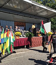 Delegate Delores L. McQuinn, chair of the Richmond Slave Trail Commission, addresses the audience at Monday’s development ceremony at the Lumpkin’s Jail site in Shockoe Bottom. Among those joining her on the stage were Richmond Mayor Dwight C. Jones, Gov. Terry McAuliffe, former Gov. Bob McDonnell, Congressman Robert C. “Bobby” Scott, City Council President Michelle Mosby and Dr. Joseph F. Johnson, interim president of Virginia Union University. 