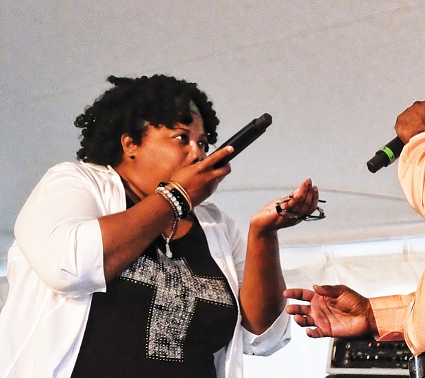 Paris Nicole and her father, Ed Cage, beatbox during their performance Sunday. Right, 