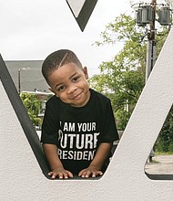 
Planning ahead//
Tayshawn Williams has his eye on the future. The youngster was spotted wearing his message at the recent 2nd Street Festival in Jackson Ward.