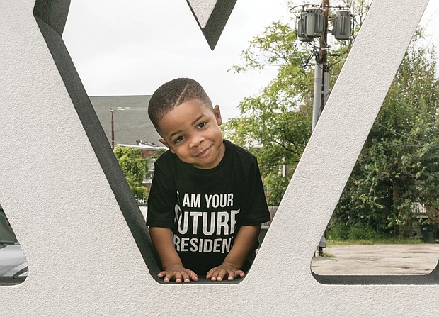 
Planning ahead//
Tayshawn Williams has his eye on the future. The youngster was spotted wearing his message at the recent 2nd Street Festival in Jackson Ward.