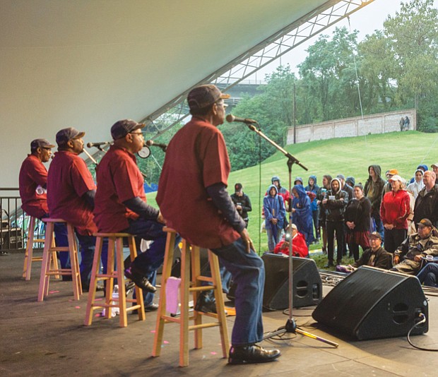 Music, music, music //  The Fairfield Four gospel group croons to the small crowd that braved the rain Saturday.
