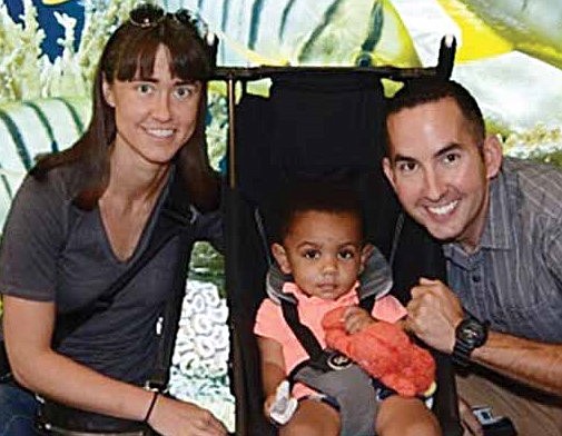 Ariel and Johnathan Szablewski with their two-year-old son Lucas, who was adopted through the Cradle Adoption agency. The Cradle sponsors Our Children initiative, which is a multi-year series of programs and events aimed at educating families about the realities and injustices that Black children may experience in societal interactions, and provides support to those families.