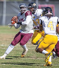 Virginia Union University quarterback Shawheem Dowdy drops back to pass during last Saturday’s comeback victory over Bowie State University at Hovey Field in Richmond.