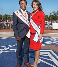 Mr. VSU Sebastian Despiau and Ms. VSU Ebony Acton stop for a photo at last Saturday’s homecoming football game, where they were introduced to the crowd.