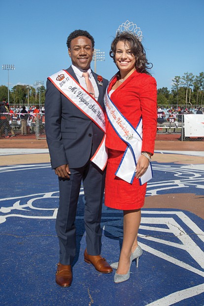 Mr. VSU Sebastian Despiau and Ms. VSU Ebony Acton stop for a photo at last Saturday’s homecoming football game, where they were introduced to the crowd.