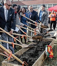 Groundbreaking // Richmond Mayor Dwight C. Jones, left, leads the groundbreaking Monday for the $40 million Church Hill North Revitalization Project, which will replace the former Armstrong High School with 250 to 300 new apartments and single-family houses. Location: 1611 N. 31st St. near the Henrico County line. 
Joining the mayor at the ceremony are, from left, Richmond Delegate Delores L. McQuinn, City Council President Michelle R. Mosby, city Chief Administrative Officer Selena Cuffee-Glenn, Richmond Redevelopment and Housing Authority Chief Executive Officer T.K. Somanath and Rob Fossi, mid-Atlantic regional director of The Community Builders development firm. The firm will soon raze the building and begin construction.
The school building, which has been vacant for 12 years, dates to 1951 when it replaced the original Armstrong building in Jackson Ward that now houses the Richmond Alternative School.
The Church Hill North project is part of the city’s effort to fight poverty. The work on the 22-acre Church Hill site is billed as the first step to a bigger project to transform the nearby Creighton Court public housing community into a mixed-income neighborhood.  