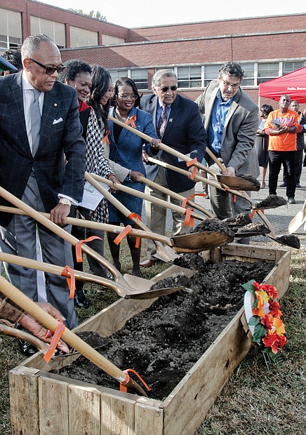 Groundbreaking // Richmond Mayor Dwight C. Jones, left, leads the groundbreaking Monday for the $40 million Church Hill North Revitalization Project, which will replace the former Armstrong High School with 250 to 300 new apartments and single-family houses. Location: 1611 N. 31st St. near the Henrico County line. 
Joining the mayor at the ceremony are, from left, Richmond Delegate Delores L. McQuinn, City Council President Michelle R. Mosby, city Chief Administrative Officer Selena Cuffee-Glenn, Richmond Redevelopment and Housing Authority Chief Executive Officer T.K. Somanath and Rob Fossi, mid-Atlantic regional director of The Community Builders development firm. The firm will soon raze the building and begin construction.
The school building, which has been vacant for 12 years, dates to 1951 when it replaced the original Armstrong building in Jackson Ward that now houses the Richmond Alternative School.
The Church Hill North project is part of the city’s effort to fight poverty. The work on the 22-acre Church Hill site is billed as the first step to a bigger project to transform the nearby Creighton Court public housing community into a mixed-income neighborhood.  