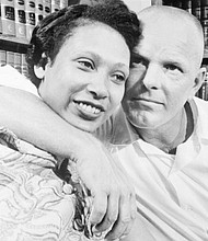  Richard Loving embraces his wife, Mildred, at a Washington press conference on June 13, 1967, one day after the U.S. Supreme Court’s ruling overturned the ban on interracial marriage in Virginia and 15 other states.