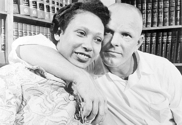  Richard Loving embraces his wife, Mildred, at a Washington press conference on June 13, 1967, one day after the U.S. Supreme Court’s ruling overturned the ban on interracial marriage in Virginia and 15 other states.