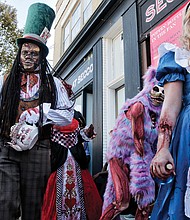 The zombies silently limped and paraded their way
west on Cary Street to Nansemond Street, where they made a U-turn and headed east on Cary Street to their final resting place, The Byrd Theatre. The Zombie Walk raises hundreds of dollars for charity each year.