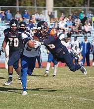 Virginia State University quarterback Tarian Ayres escapes the Chowan University defense to run 19 yards and dive for a touchdown in the third quarter of last Saturday’s game at Rogers Stadium in Ettrick. VSU won 49-21.