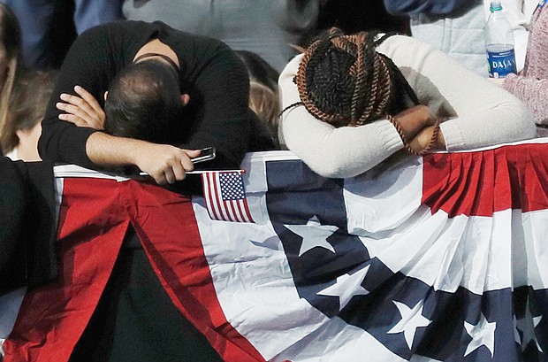 Rick Wilking/Reuters 
Supporters of Hillary Clinton react early Wednesday morning as results of the presidential election come in. Thousands of supporters attended the rally for Mrs. Clinton in New York expecting a different outcome in the presidential race. 