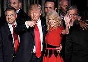 President-elect Donald Trump hugs his campaign manager, Kellyanne Conway, while he greets staff and supporters after claiming victory early Wednesday. Mr. Trump won key swing states, including Ohio and Pennsylvania. 